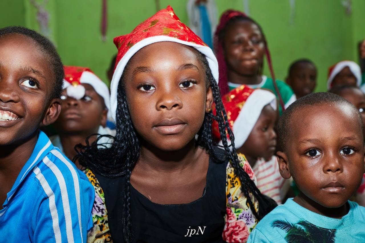 Children receiving school kits